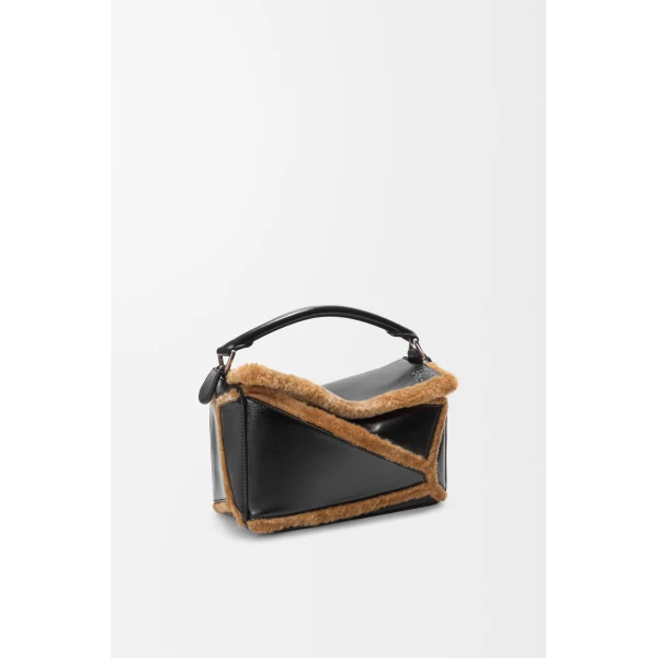 Loewe Small Puzzle Aviator bag in glossy lambskin and shearling, Black/Brown | Shoulder & Crossbody Bags | Coveti