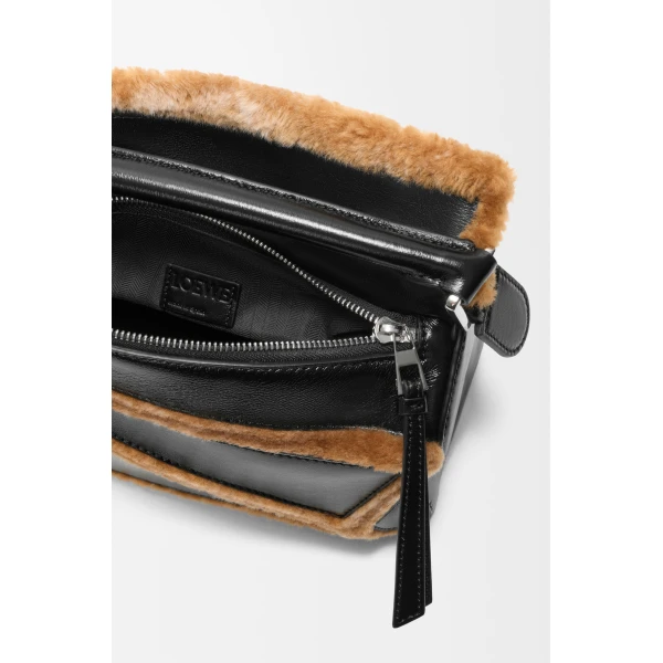 Loewe Small Puzzle Aviator bag in glossy lambskin and shearling, Black/Brown | Shoulder & Crossbody Bags | Coveti