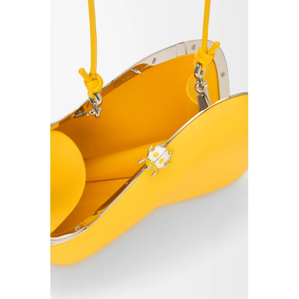 Loewe Twisted Minaudiere in bicolour nappa lambskin, Daisy Yellow/White | Mini Bags | Coveti