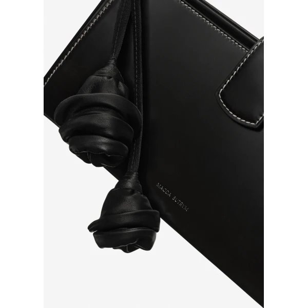 Apolonia bag in black leather with flower charm and contrast stitching - Image 3