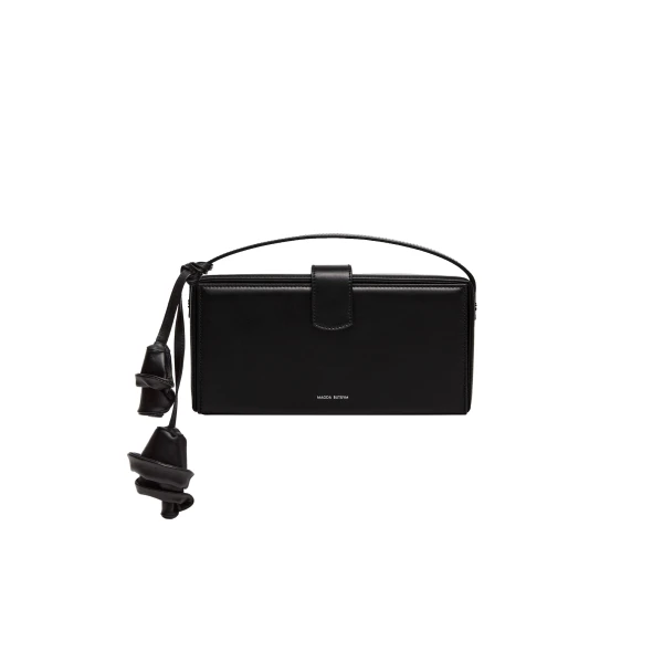 Apolonia bag in black leather with flower charm