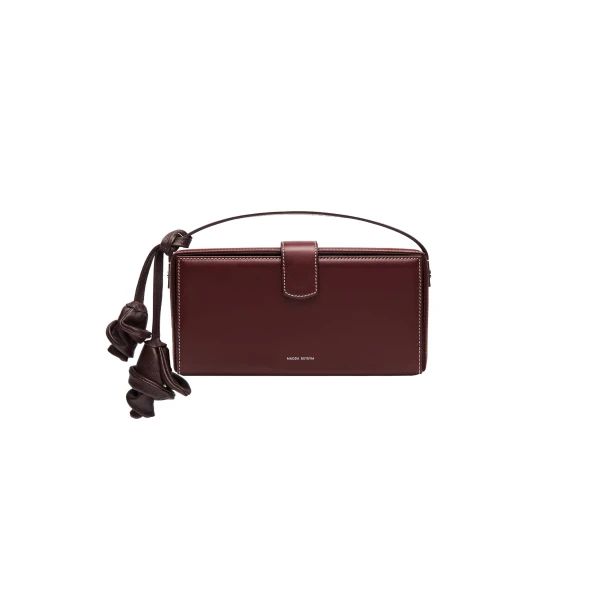 Apolonia bag in burgundy leather with flower charm