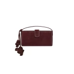 Magda Butrym Apolonia bag in burgundy suede with flower charm
