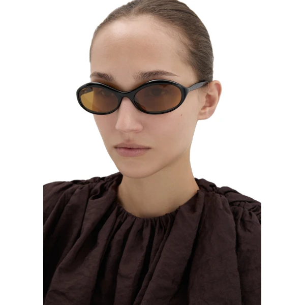 Oval sunglasses in black with yellow lenses - Image 5