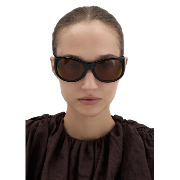 Round sunglasses in black with yellow lenses - Image 4