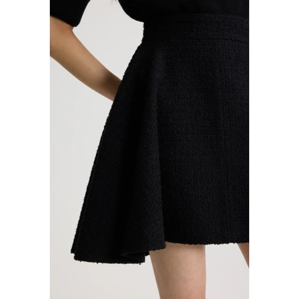 Asymmetric mini skirt in Black sustainable wool blend tweed - Image 4