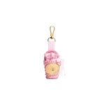 Patou Iconic bucket charm in Primrose Pink raffia