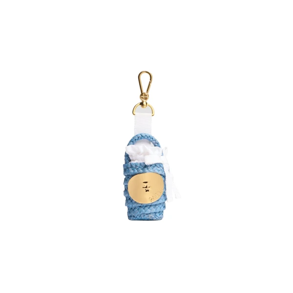 Patou Iconic bucket charm in Skylight Blue raffia