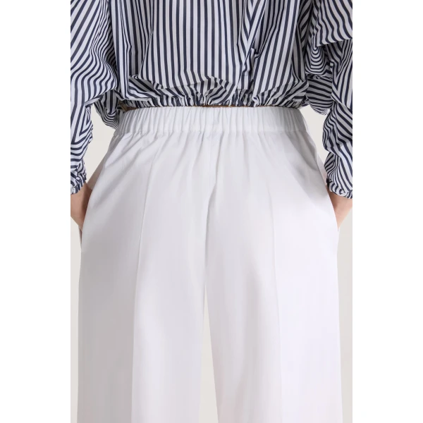 Organic cotton elasticated waist trousers in White - Image 4