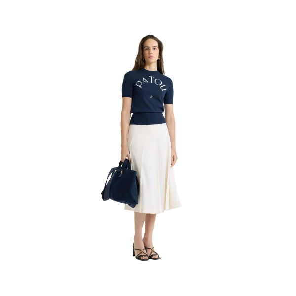 Pleated midi skirt in Ivory sustainable technical wool twill - Image 2