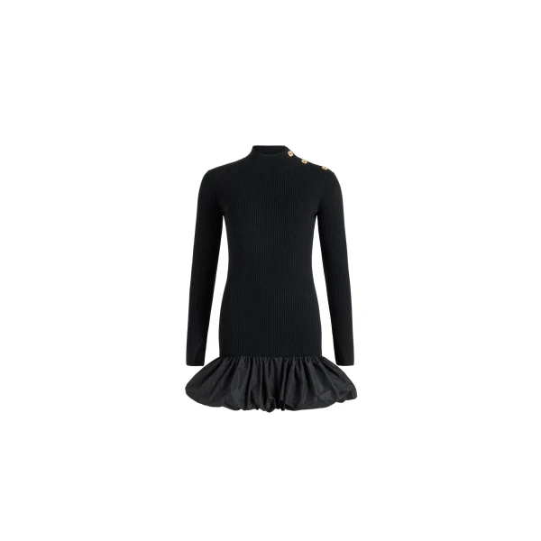 Patou Ruffle hem ribbed mini dress in Black wool and faille