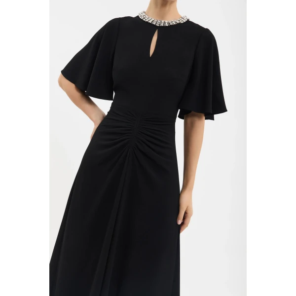 designer dresses at Coveti