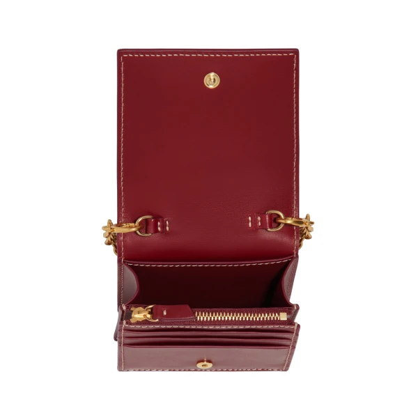 schiaparelli mini leather keyhole clutch