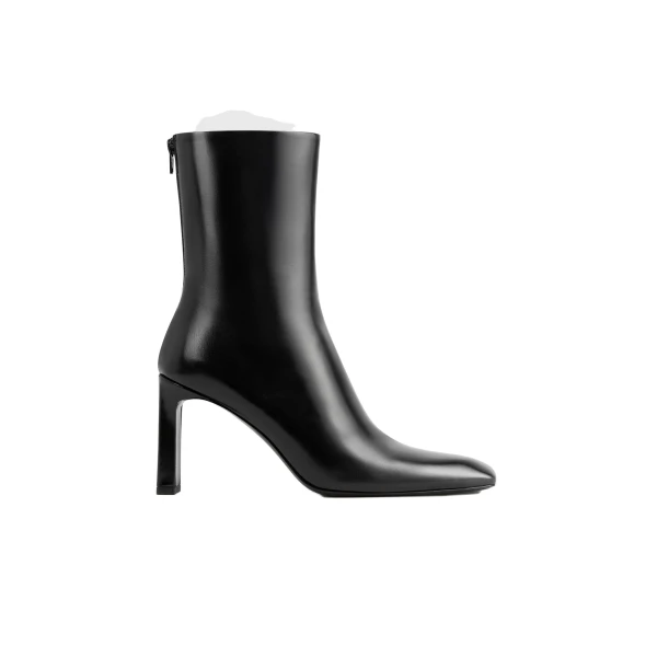 Toteme Bar glossy leather boots in Black