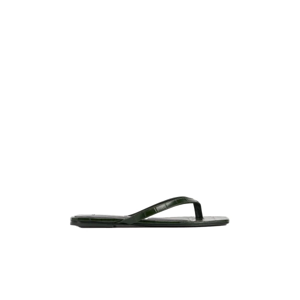 Toteme Croco-embossed flip flops in Dark green