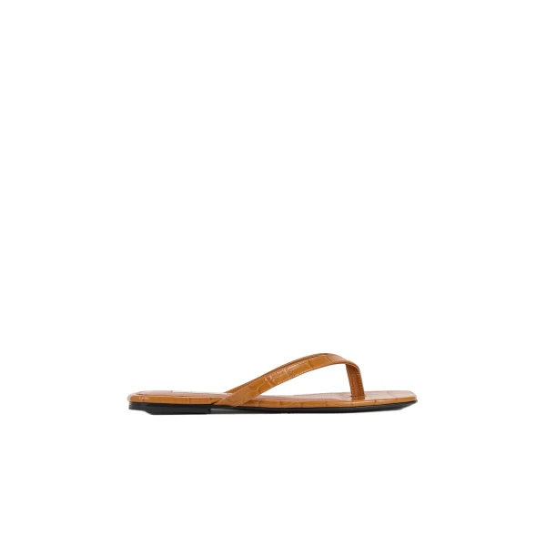 Toteme Croco-embossed flip flops in Tangerine