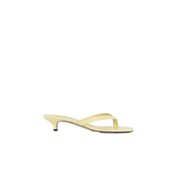 Toteme Naplack heeled flip flops in Buttercup