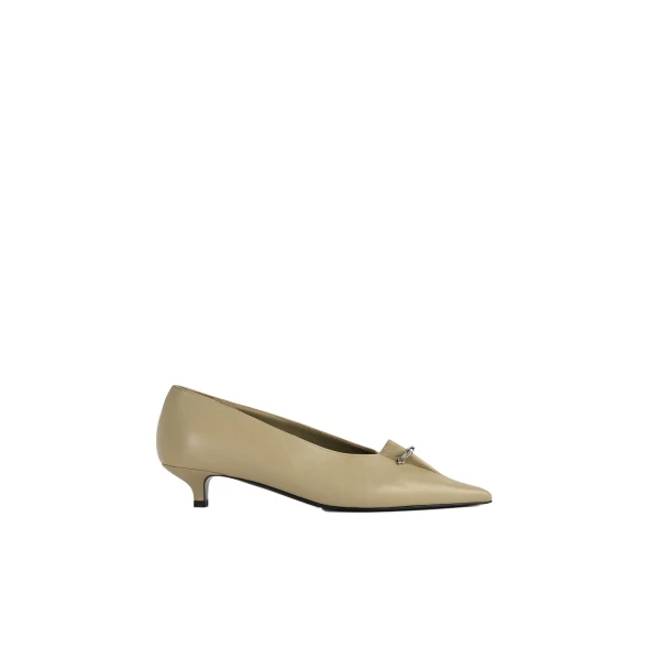 Toteme Pierced nappa pumps in Cashew
