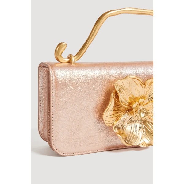Aje Alessia Flower Clutch in Rose Gold Metallic | Clutch Bags | Coveti