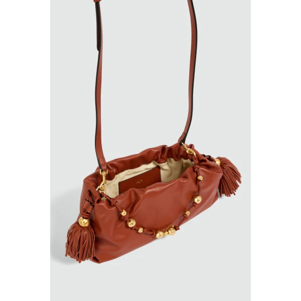 Aje Amber Clutch in Chestnut | Clutch Bags | Coveti
