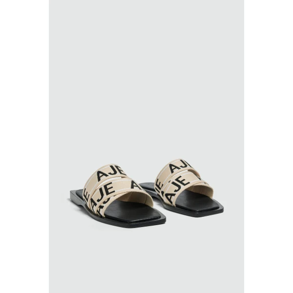 Aje Anais Slide in Black/Natural | Flip Flops & Slides | Coveti
