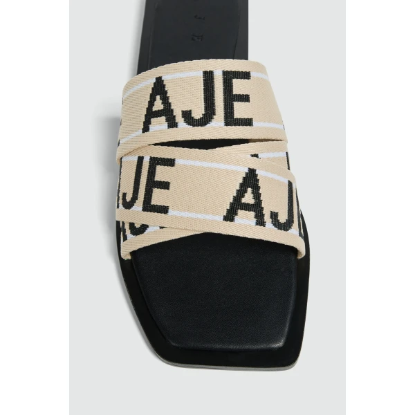 Aje Anais Slide in Black/Natural | Flip Flops & Slides | Coveti