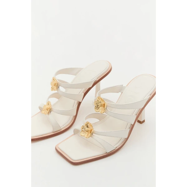 Aje Aventura Heel in Ivory | Heels | Coveti