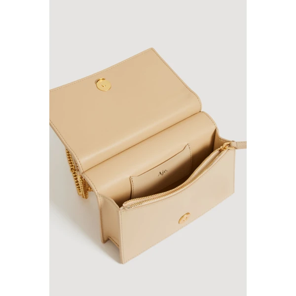 Aje Cece Clutch in Beach Beige | Clutch Bags | Coveti