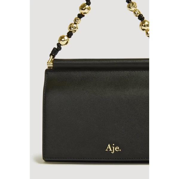Aje Cece Clutch in Black | Clutch Bags | Coveti