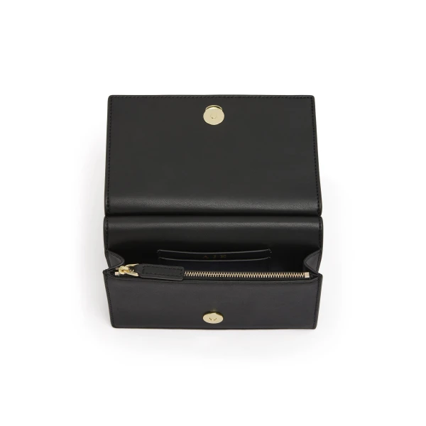 Aje Cece Clutch in Black | Clutch Bags | Coveti