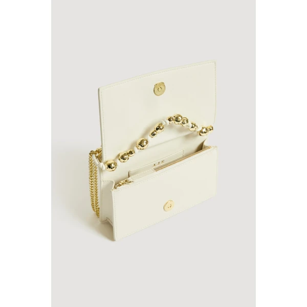 Aje Cece Clutch in Ivory | Clutch Bags | Coveti