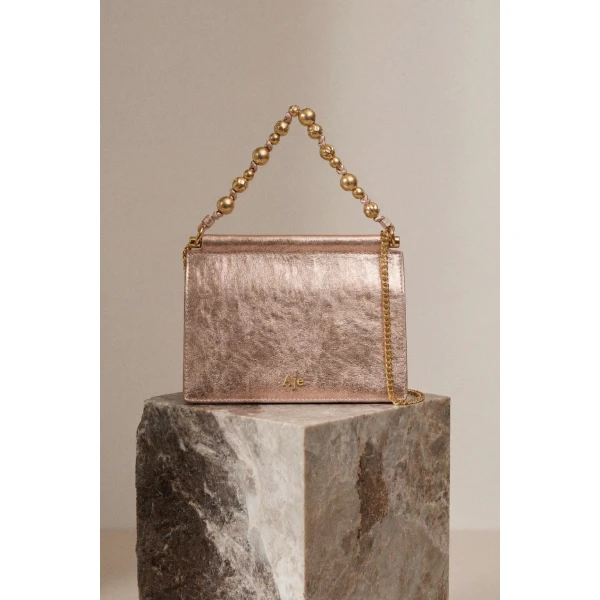 Aje Cece Metallic Clutch in Rose Gold | Clutch Bags | Coveti