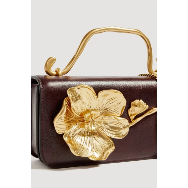 Aje Celeste Flower Clutch in Merlot | Clutch Bags | Coveti