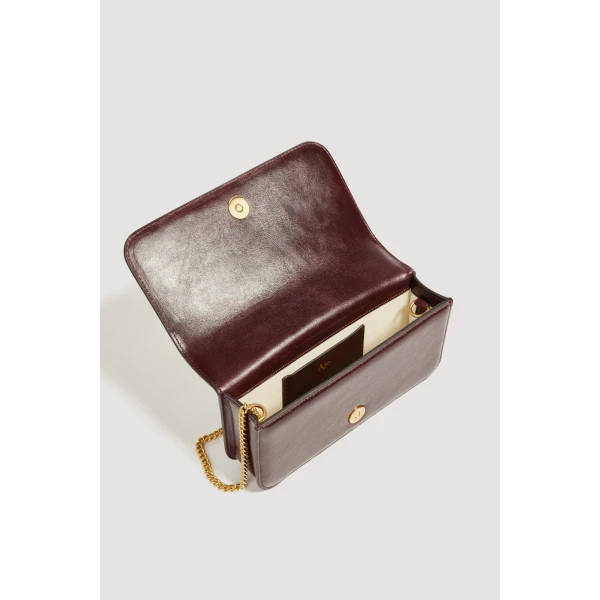 Aje Celeste Flower Clutch in Merlot | Clutch Bags | Coveti