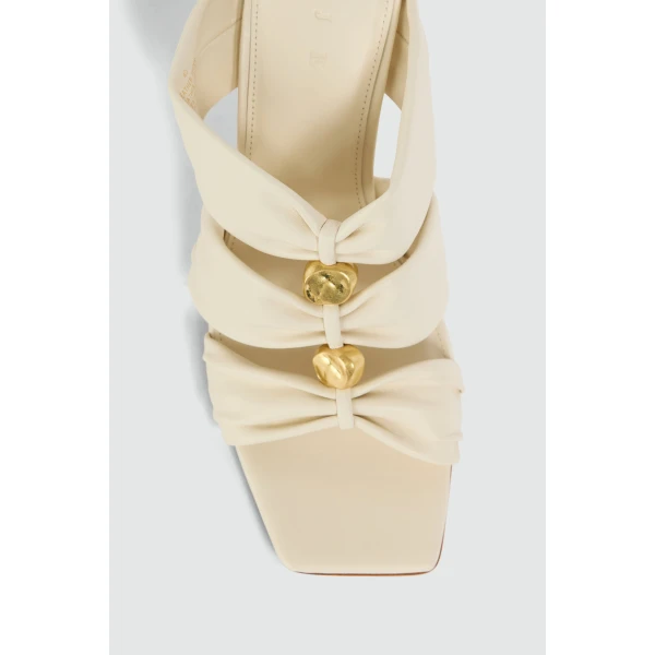 Aje Clara Heel in Ivory | Heels | Coveti