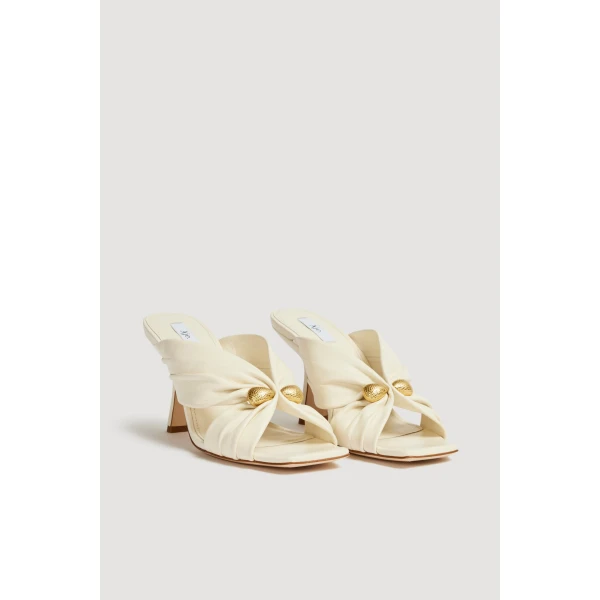 Aje Clemence Gathered Heel in Ivory | Heels | Coveti