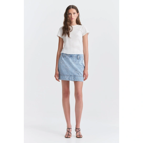 Aje Coast Logo Denim Mini Skirt in Light Wash Blue | Skirts | Coveti