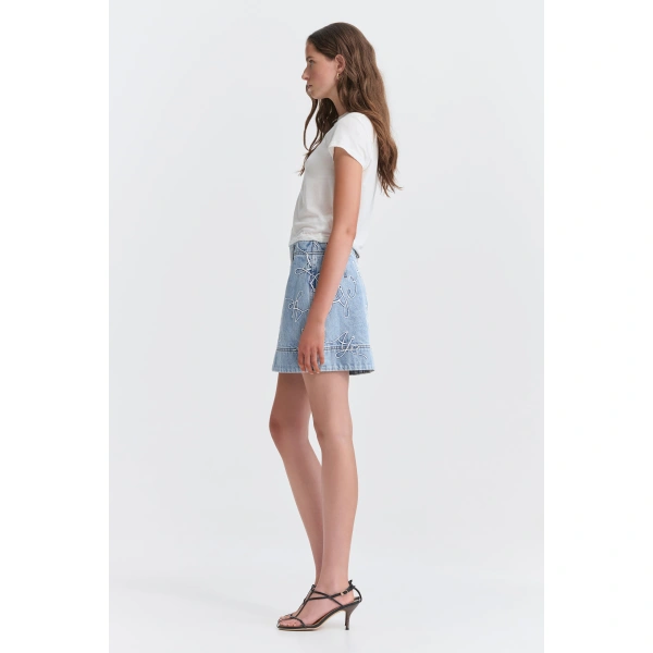 Aje Coast Logo Denim Mini Skirt in Light Wash Blue | Skirts | Coveti