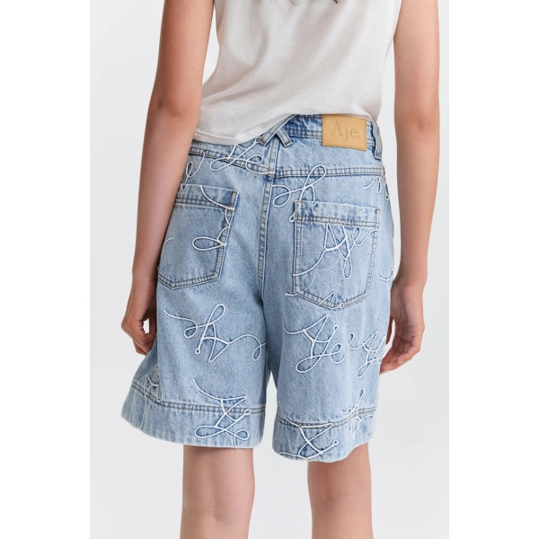 Aje Coast Logo Denim Shorts in Light Wash Blue | Shorts | Coveti