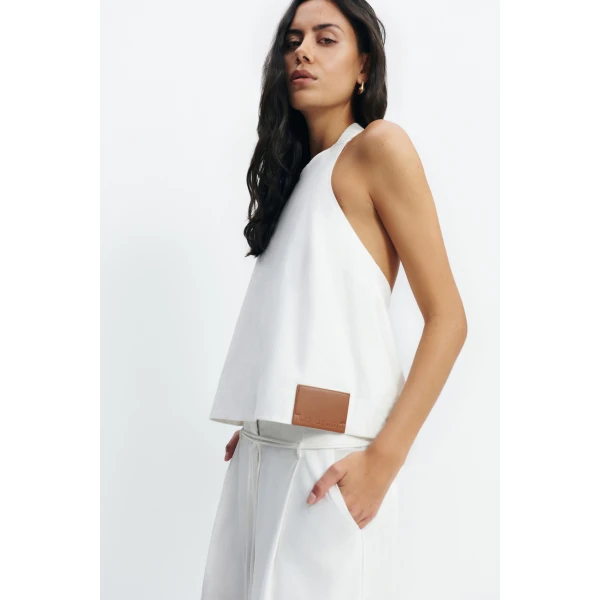Aje Corine Halter Top in White | Tops | Coveti
