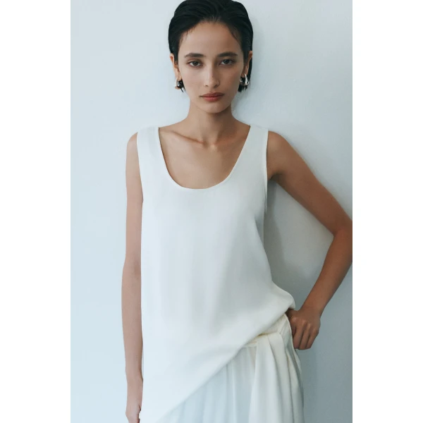 Aje Dawn Asymmetric Top in Ivory | Tops | Coveti