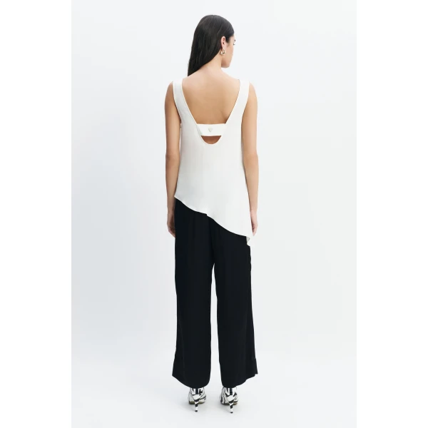 Aje Dawn Asymmetric Top in Ivory | Tops | Coveti