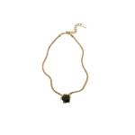 Aje Dusk Resin Necklace in Gold/Onyx | Necklace | Coveti