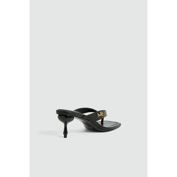 Aje Earthen Heel Thong in Black | Heels | Coveti