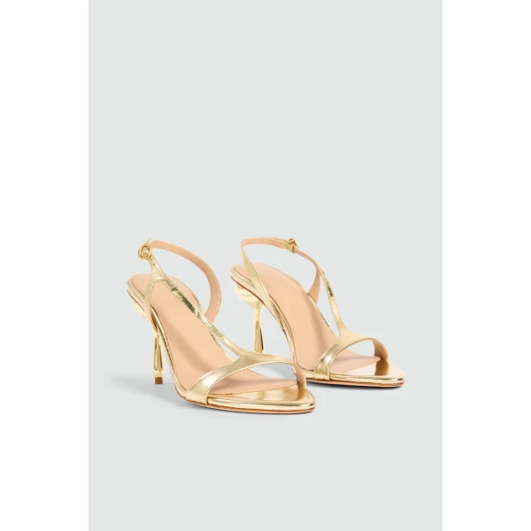 Aje Elan Asymmetric Droplet Heel in Gold | Heels | Coveti