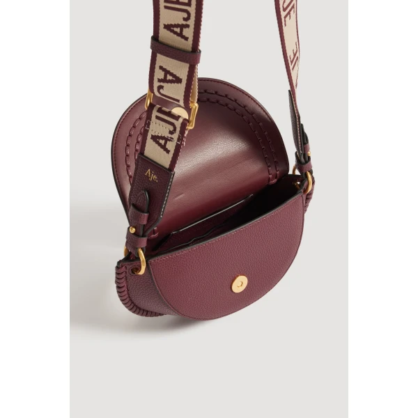 Aje Emery Small Saddle Bag in Mulberry | Shoulder & Crossbody Bags | Coveti