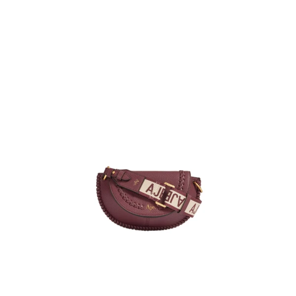 Aje Emery Small Saddle Bag in Mulberry | Shoulder & Crossbody Bags | Coveti