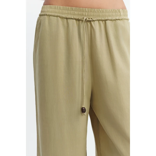 Aje Evie Relaxed Pant in Pale Olive | Pants | Coveti