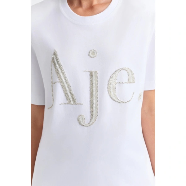 Aje Katalin Embellished Logo Tee in White/Silver | T-shirts | Coveti