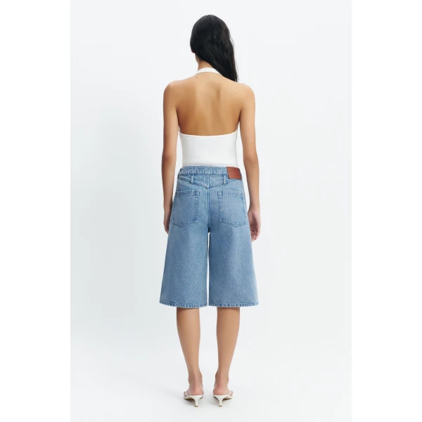 Aje Kendall Denim Jort in Light Wash | Tops | Coveti